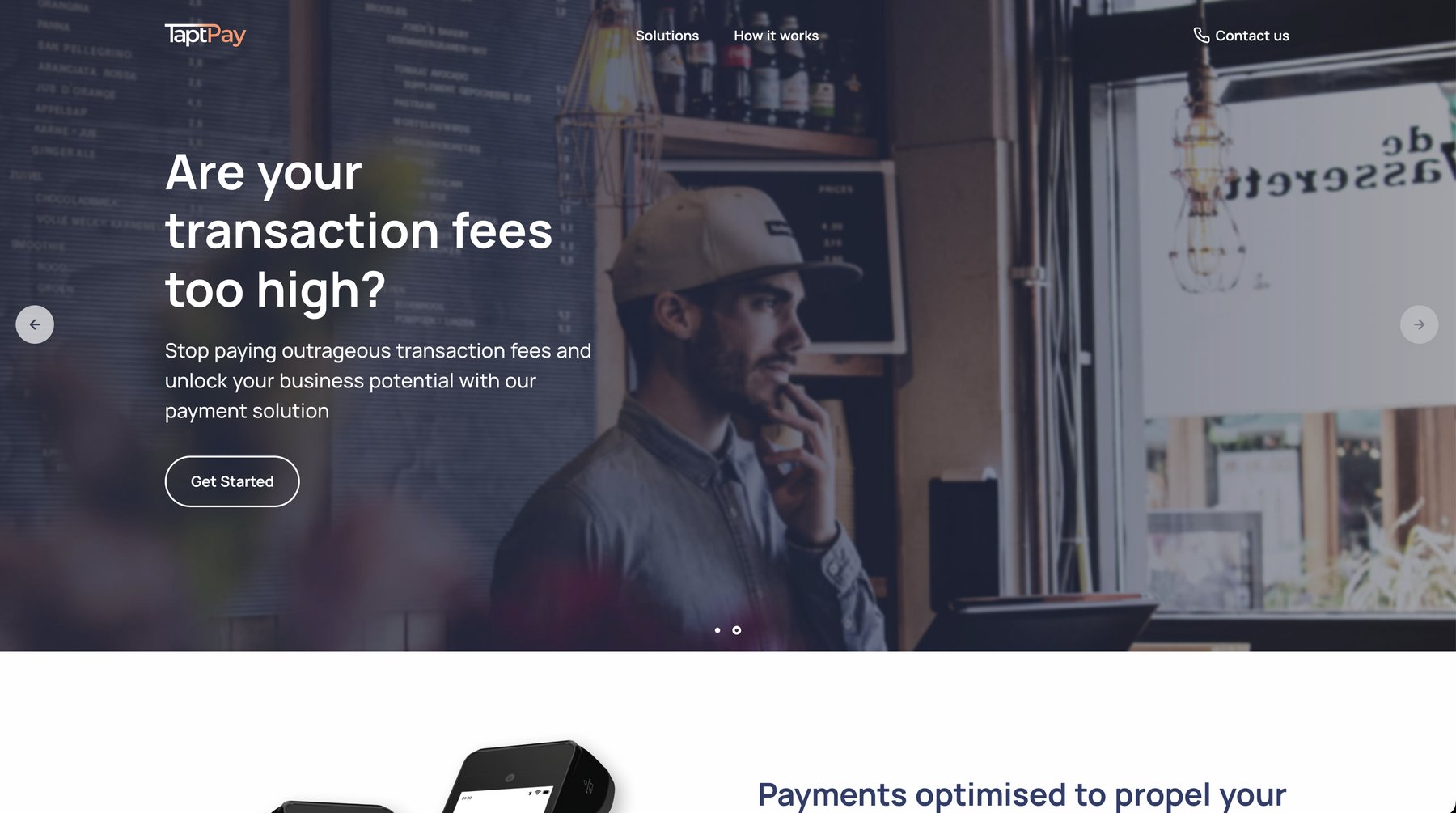 Taptpay home page as I delivered it: a café owner at the counter behind the headline “Are your transaction fees too high?”, a “Get Started” button, and the start of a card-terminal section below.